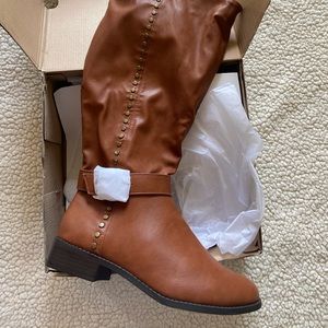 Side studded knee high boots